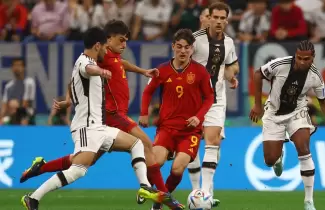Espa�a empat� con Alemania y siguen en carrera