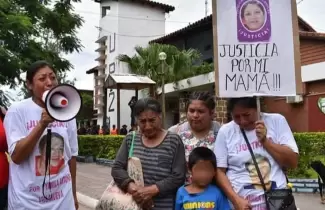 familia en la marcha de justicia por yamila