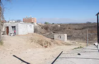 venta de terrenos ilegales en Alto Comedero