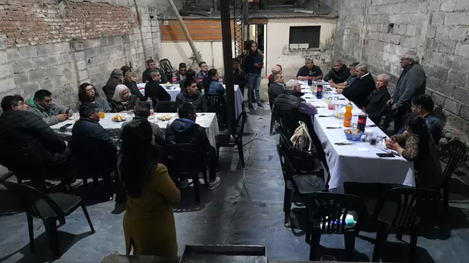 Pascuttini con trabajadores