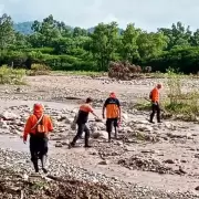 Hallaron sin vida a un hombre en el río Grande y continúa la búsqueda de su hermano